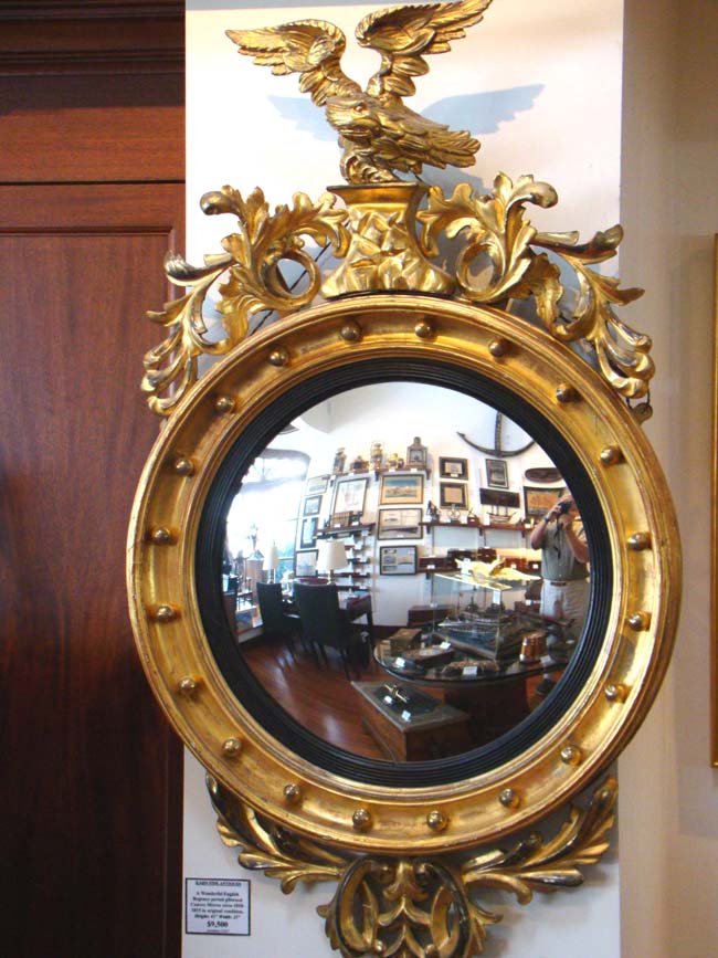 An English Regency Giltwood Convex Mirror circa 1810-1820
